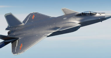 Alternative Text and a Caption for the J-20 image you provided are as follows: Alternative Text A high-angle close-up of a Chinese J-20 stealth fighter jet flying against a blue sky, showcasing its unique canard-delta wing design.