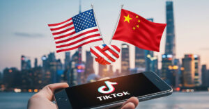 A conceptual image showing the flags of the United States and China shaking hands over a glowing smartphone with the TikTok logo, symbolizing the diplomatic negotiations.