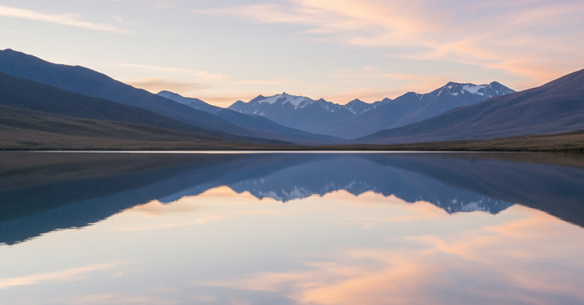 A tranquil, still pond reflecting a serene sky with soft clouds and distant mountains, symbolizing a calm and clear mind.