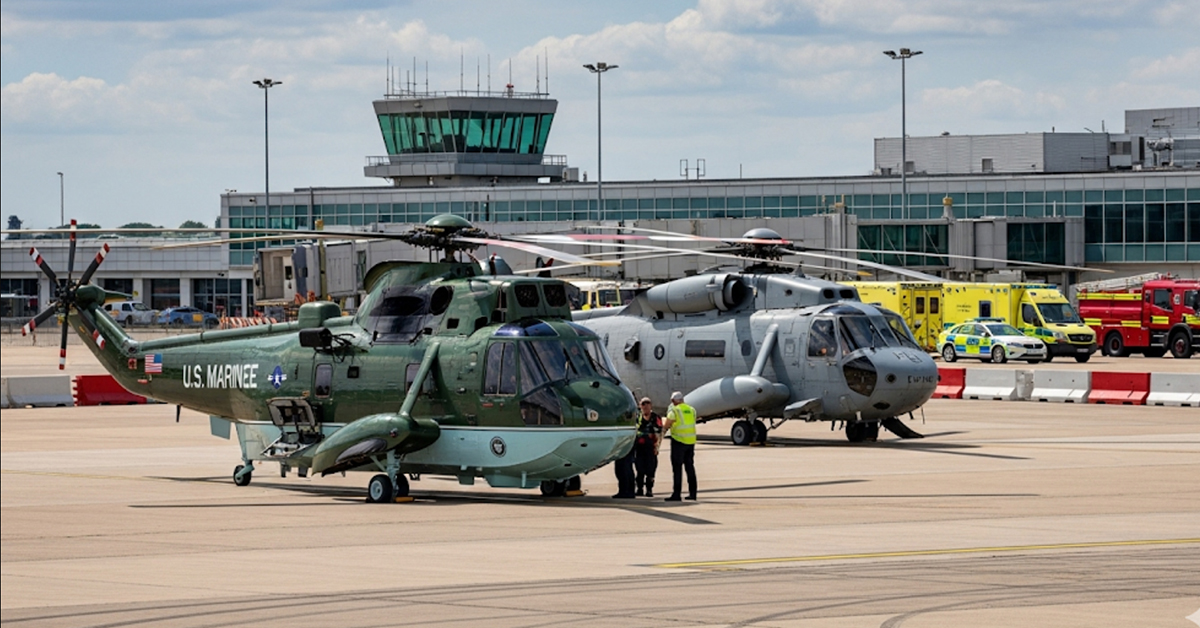 A photo of U.S. presidential helicopters, Marine One and Marine Two, parked at Luton Airport in the UK.